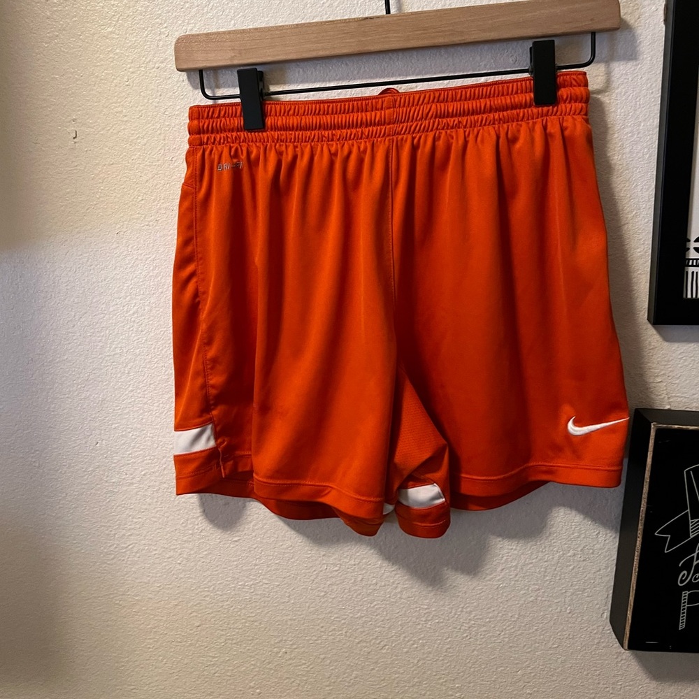 Small orange Nike shorts